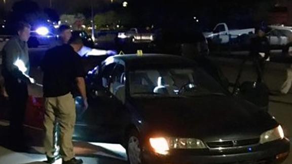 Tucson police ID man found shot to death in running car